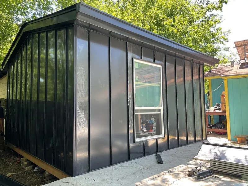 Black standing seam metal wall panels for Roof Inspection in Foster City