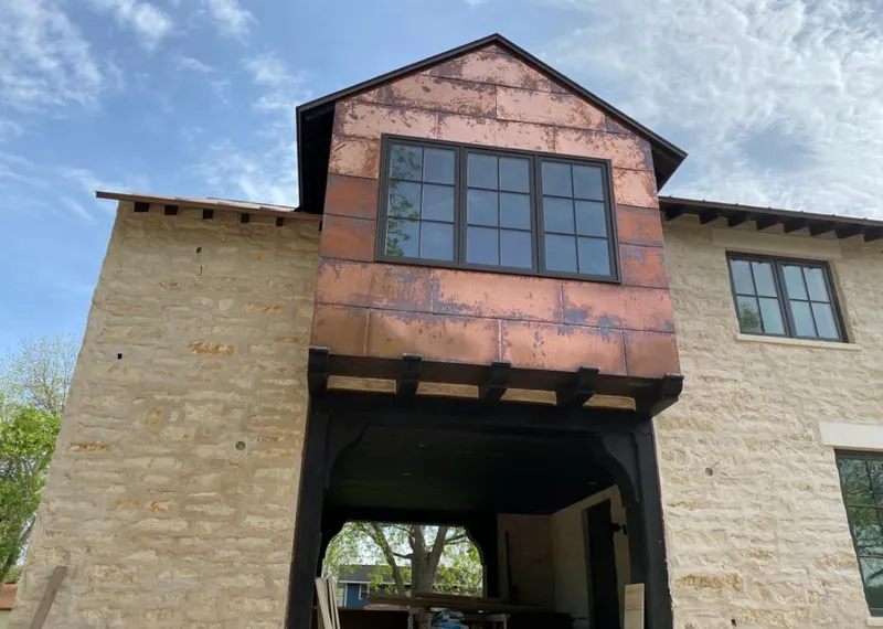 Copper metal panel facade on a stone building for Metal Roof Coating in Foster City